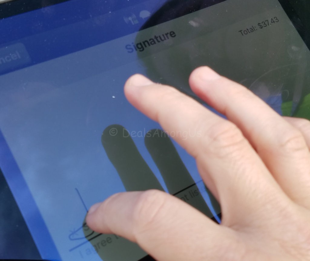 Jennifer signing for the final purchase